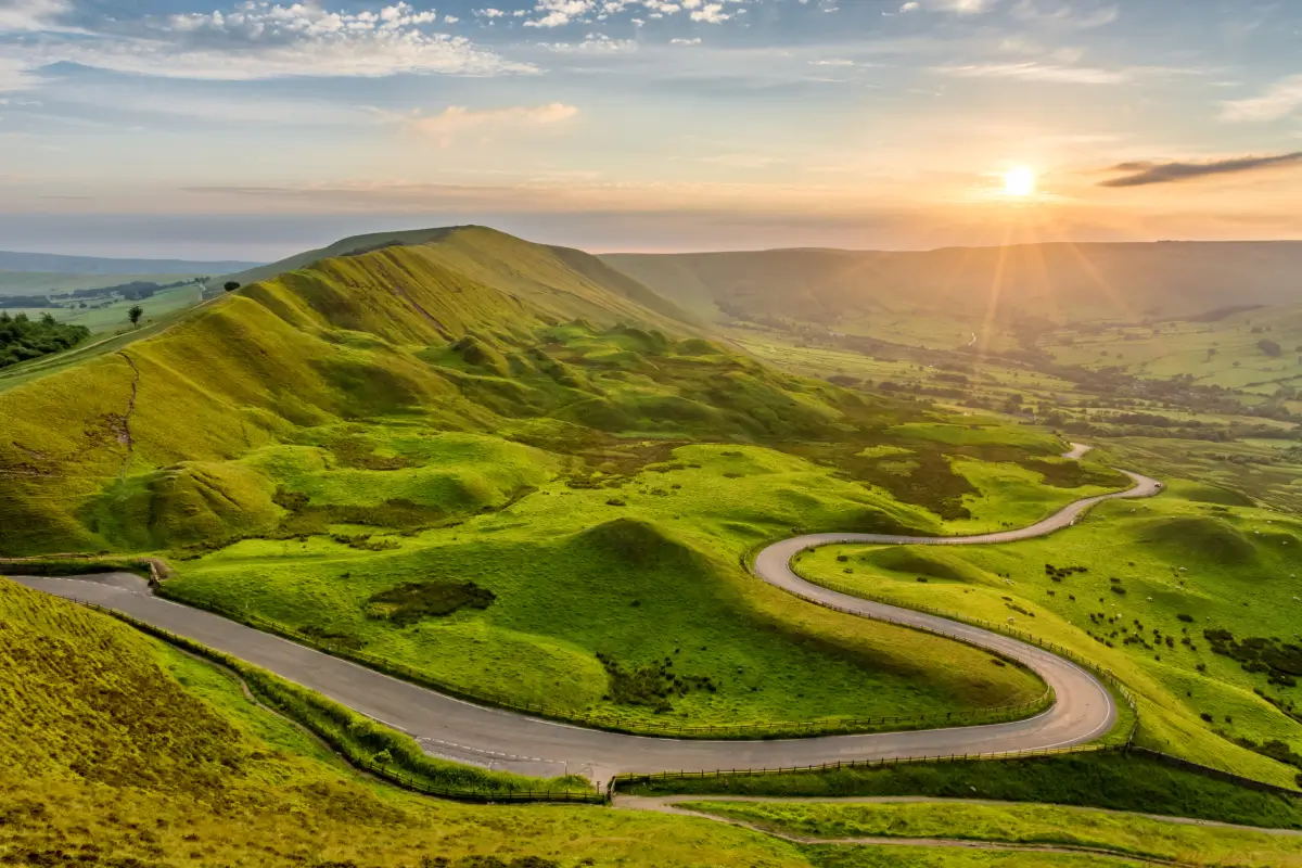 winding road about green hills