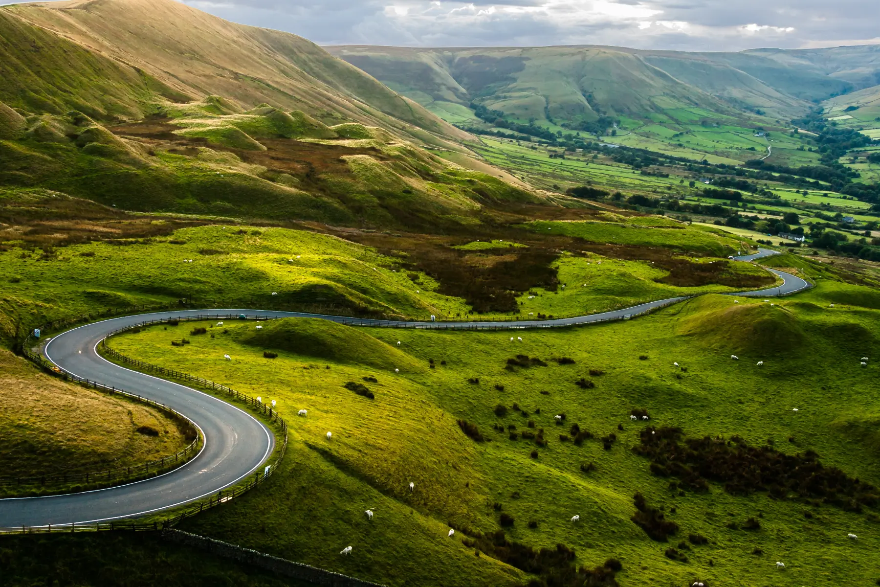 winding rode through green mountains